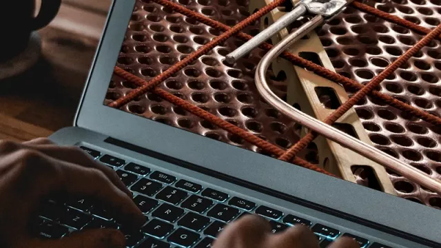 A laptop shows a close-up of an earthing system.